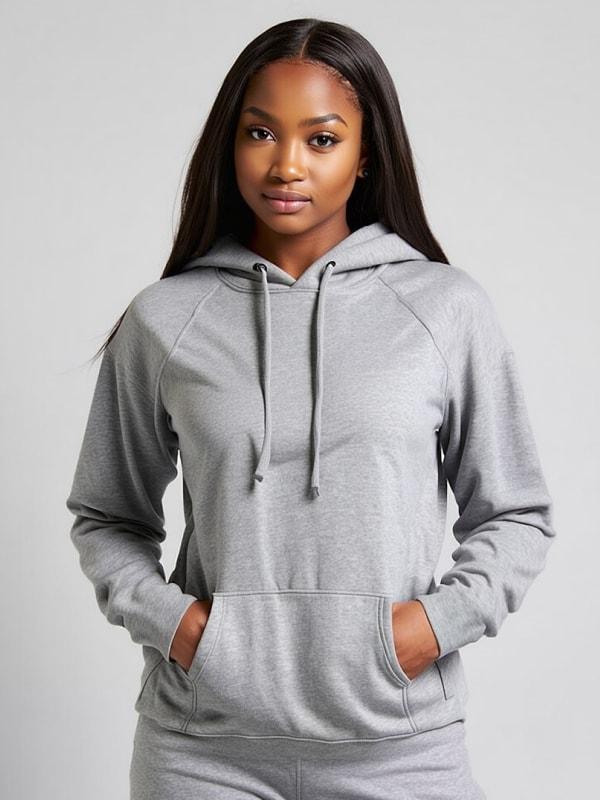 a female model wearing a grey hoodie