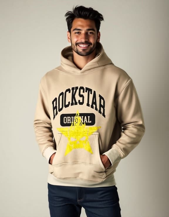 A model wearing a beige hoodie