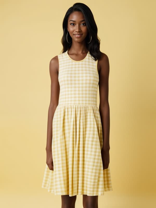 A woman in a yellow gingham dress