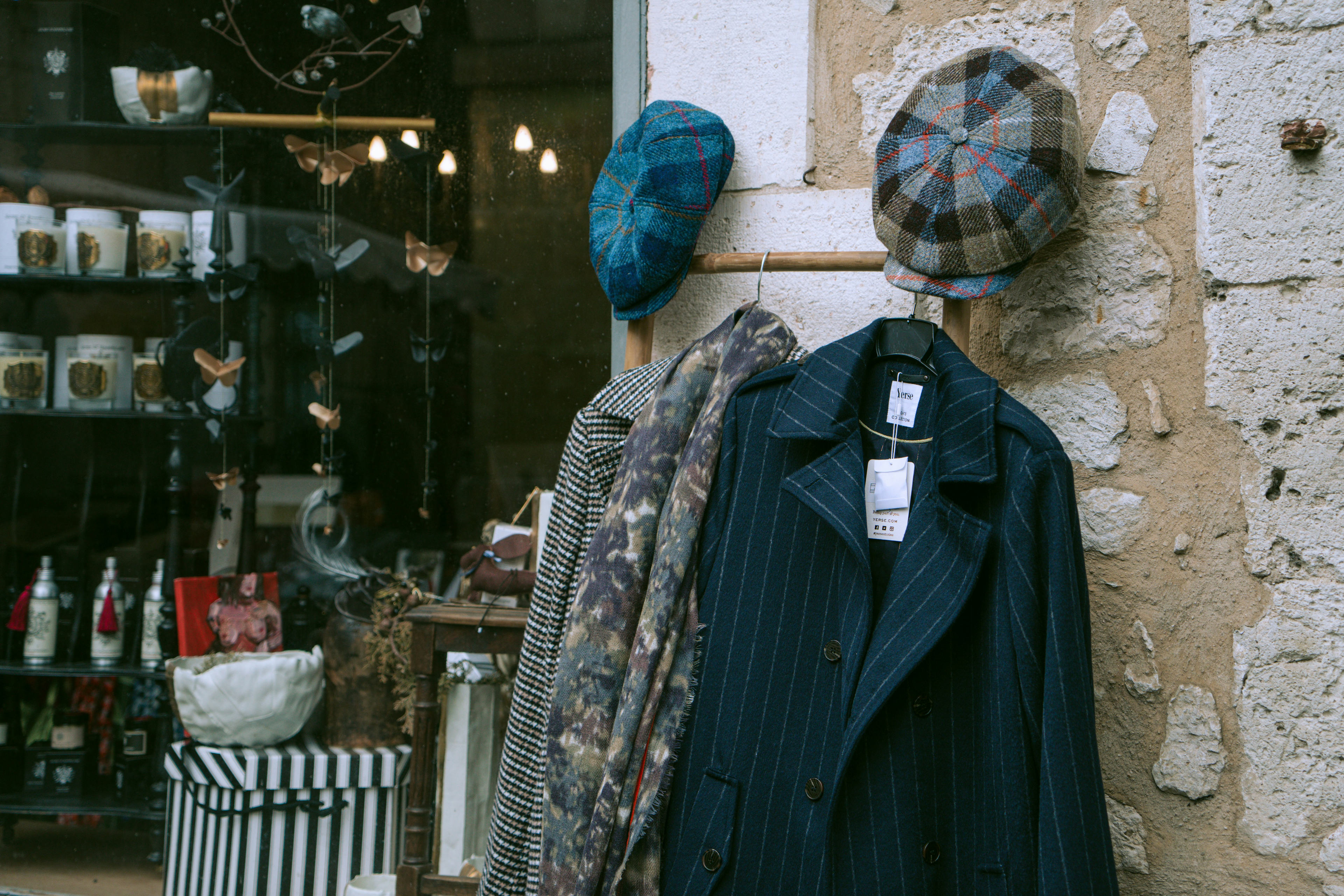 Coats and hats ready for shoppers, hinting at the early Christmas season.