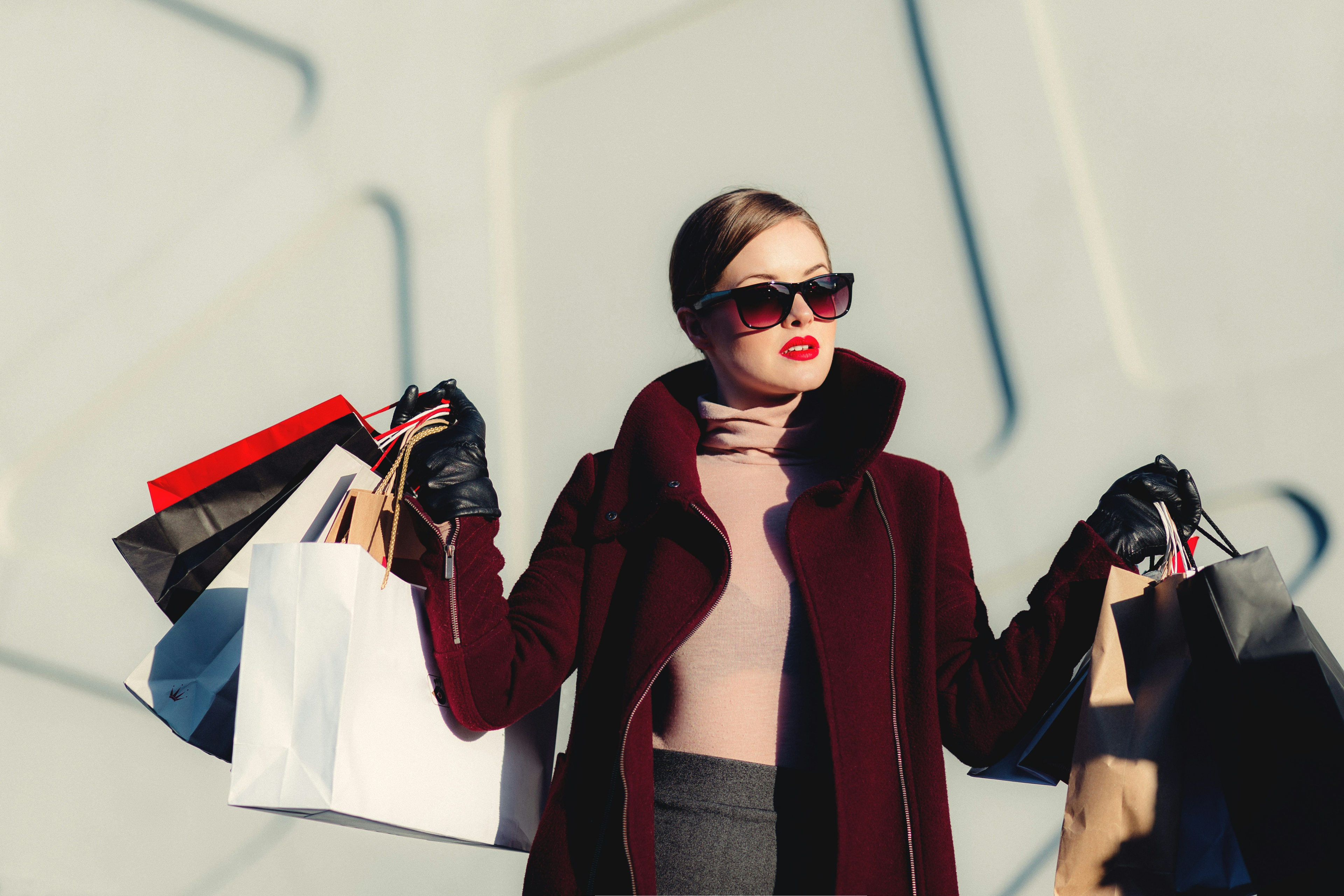  A woman holding several shopping bags after Black Friday deals
