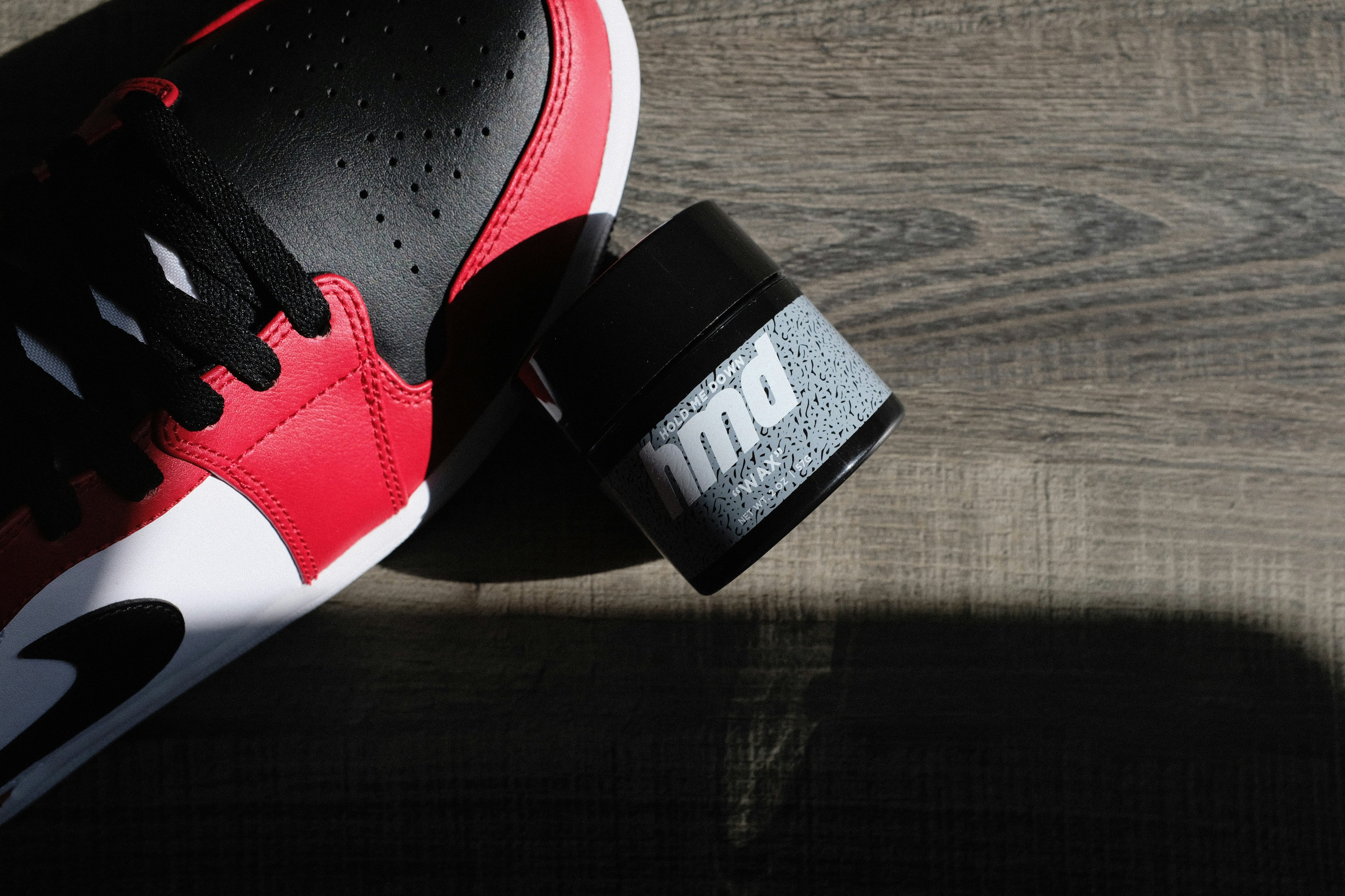 Nike uses lifestyle backgrounds to make products feel active and real.