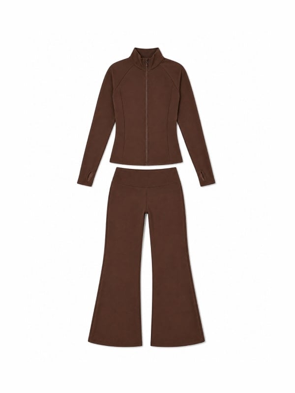 Brown long-sleeve mock-neck activewear jacket with seam detailing, paired with matching flared leggings, displayed flat on a white background.