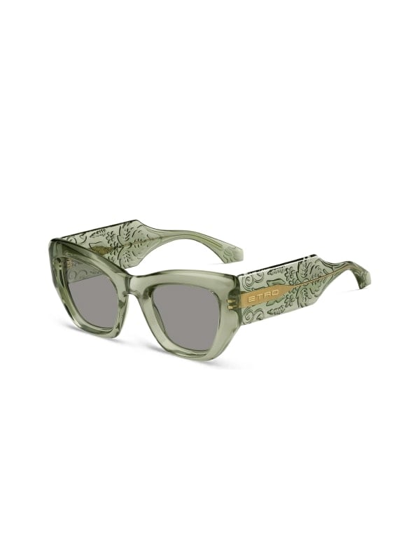 Sage green translucent cat-eye Etro sunglasses with paisley-engraved temples, shown in three-quarter view on a white background.