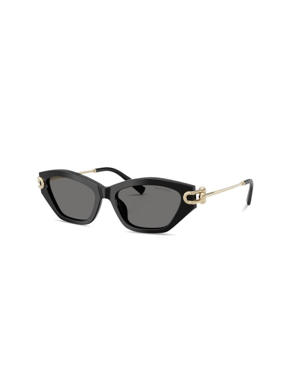 Black acetate Tiffany cat-eye sunglasses with gold metal arms and dark lenses, shown in three-quarter view on a white background.