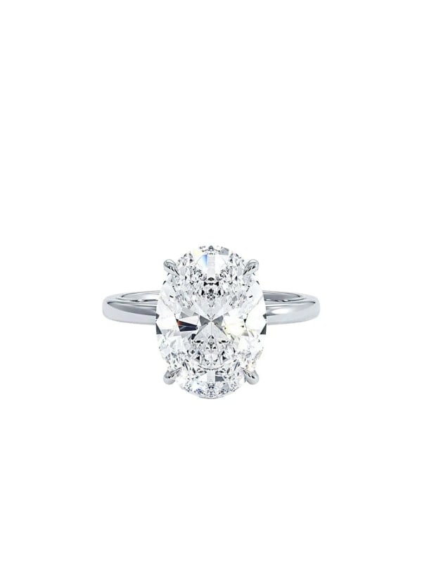 Silver solitaire engagement ring with a large oval-cut diamond and a hidden halo, displayed front-facing on a white background.