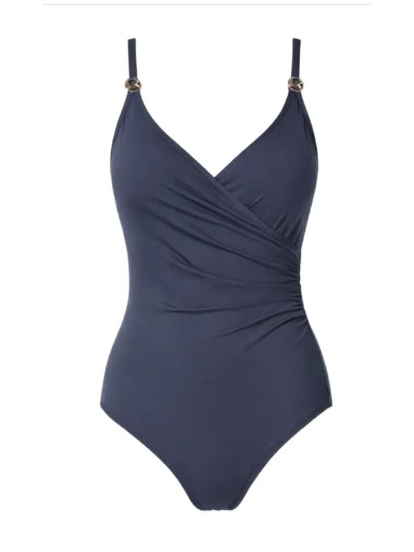 Navy blue one-piece swimsuit with a V-neckline, ruched waist detail, and gold ring hardware on the straps, displayed flat on a white background.